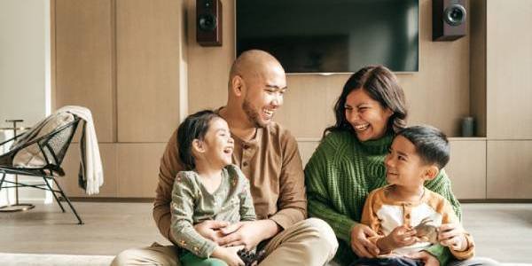 family sitting in living room